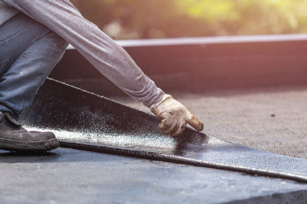 Professional Basement Waterproofing technician working in Denver, IN